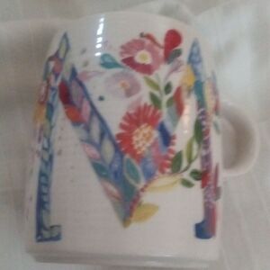Starla Halfmann M monogram. Textured Floral Mug